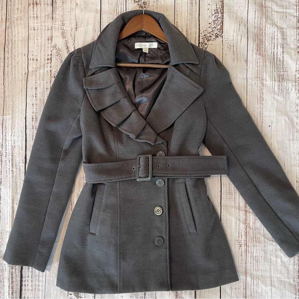 Woman’s gray coat
